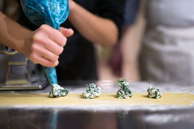 Authentic Pasta Class in Florence - Cooking, sitting down, and eating the results