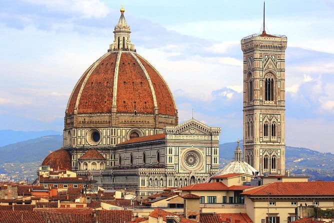 BE THE FIRST: Early Bird Florence Walking Tour & Accademia Gallery (David) - Orsanmichele and the city’s working past