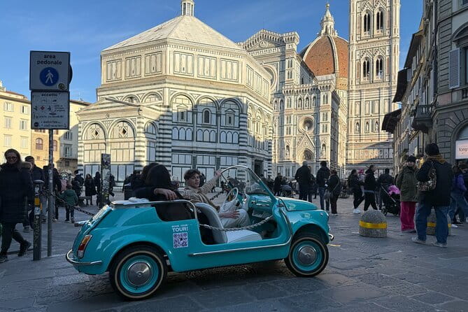 Discover Florence city center on e-cabriot fiat 500 - Piazzale Michelangelo gives you the postcard view