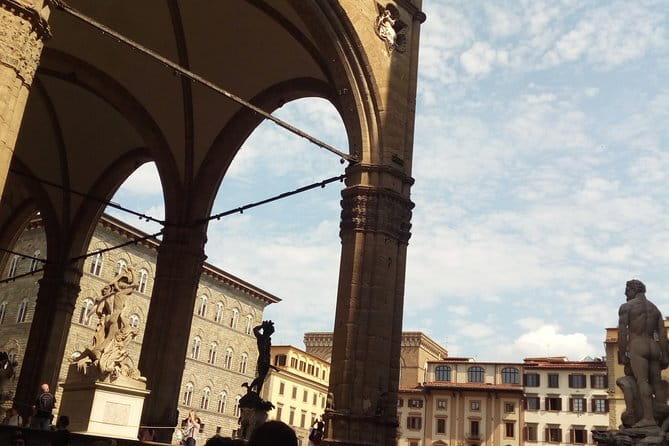 Florence: Best Of - with Tour Leader & Multilingual Audio Guide - Piazza della Repubblica shows modern Florence