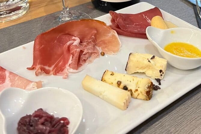 Florence Food Tour with Truffle Pasta, Steak & Free Flowing Wine - The first stop: cured meats, cheese, and 30-year balsamic