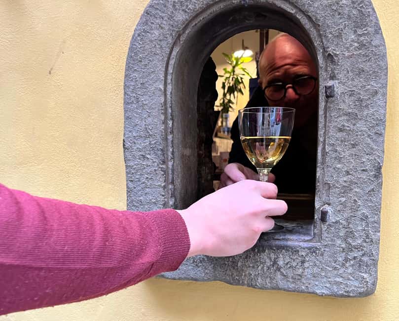 Florence: Food Walking Tour with Local Steak and Tuscan Wine - The old wine window and Florence’s aperitivo tradition