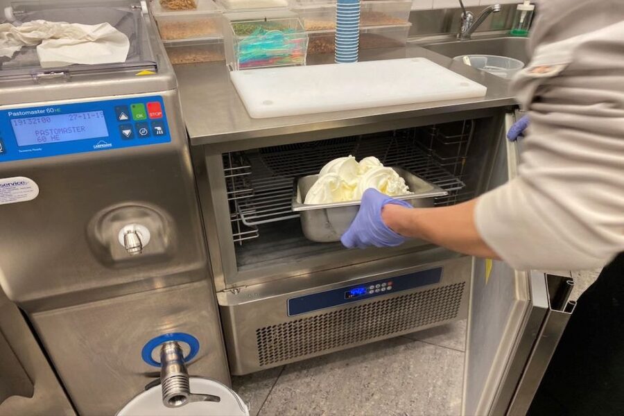 Florence: Gelato Making Class - Practicing the perfect scoop behind the counter