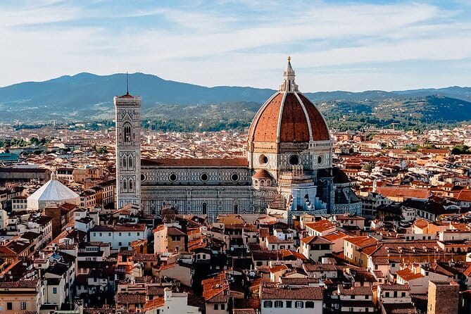 Florence Golf Cart private City tour Center & Michelangelo square - Piazza della Repubblica and the heart of old Florence