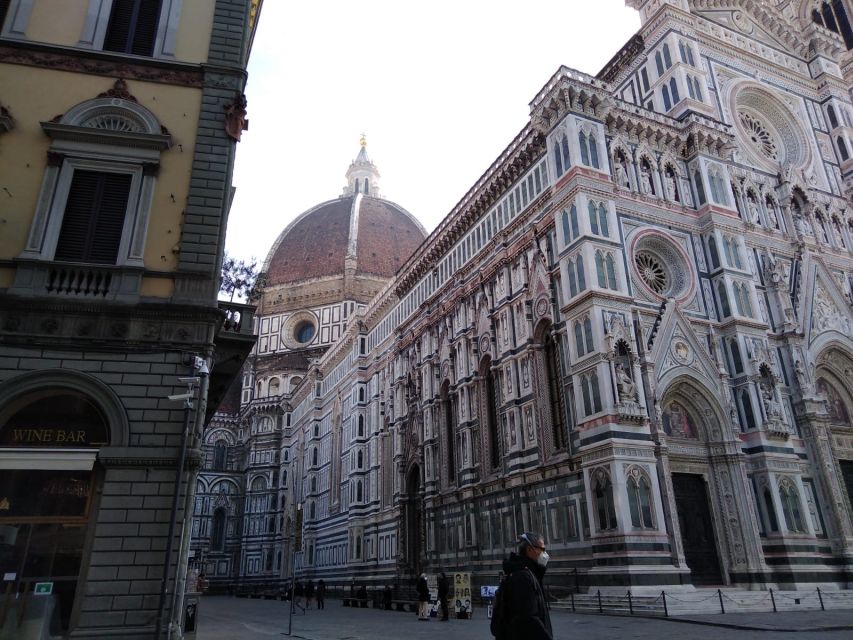 Florence: LGBTQ Renaissance Walking Tour with Mila - Crossing Santa Trinita Bridge to Pitti Palace Square