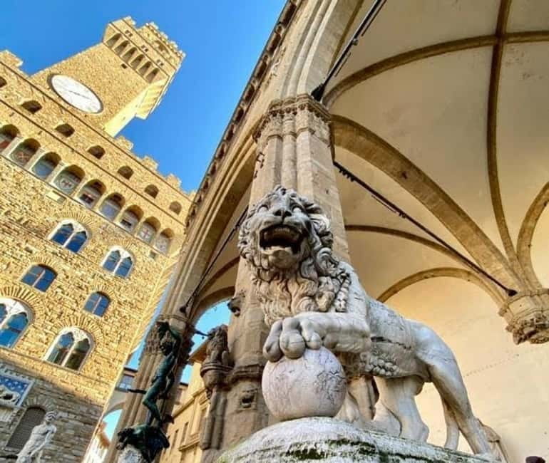 Florence Must-See Squares Walking Tour with Vincenzo - Orsanmichele, a quieter stop with an unusual past