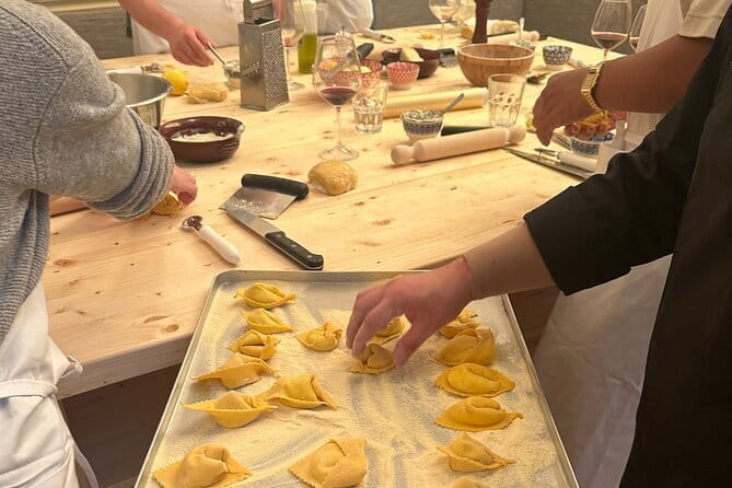 Florence: Pasta Cooking Class with Unlimited Wine - Cooking pasta inside a Florentine tower