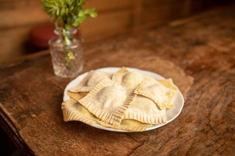 Florence: Pasta & Tiramisu Class with Unlimited Wine - Making pasta dough with eggs and flour