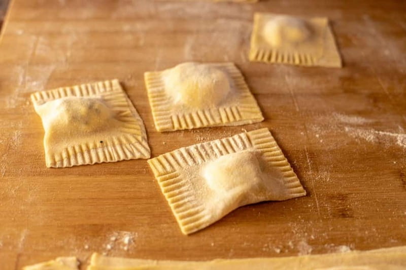 Florence: Pasta & Tiramisu Class with Unlimited Wine - Shaping tagliatelle and ricotta ravioli