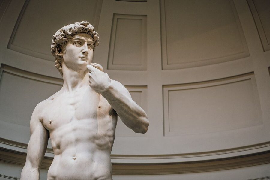 Florence: Skip-the-Line Uffizi, Accademia & Guided City Tour - Crossing Ponte Vecchio and passing the Porcellino
