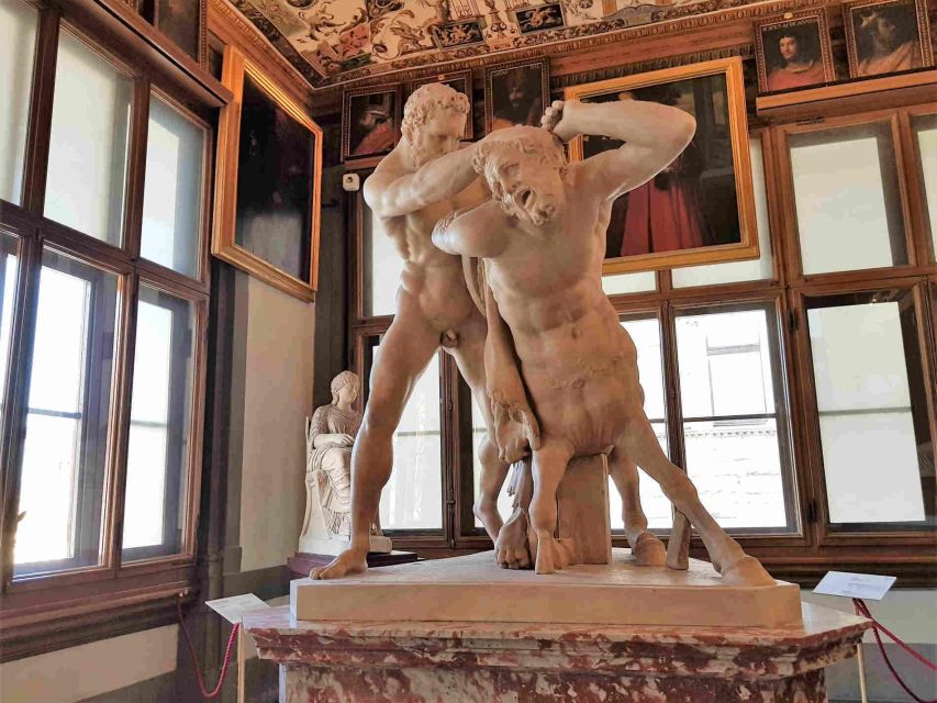 Florence: Uffizi & Accademia Priority Tickets with Audio App - Walking onward to the Uffizi Gallery