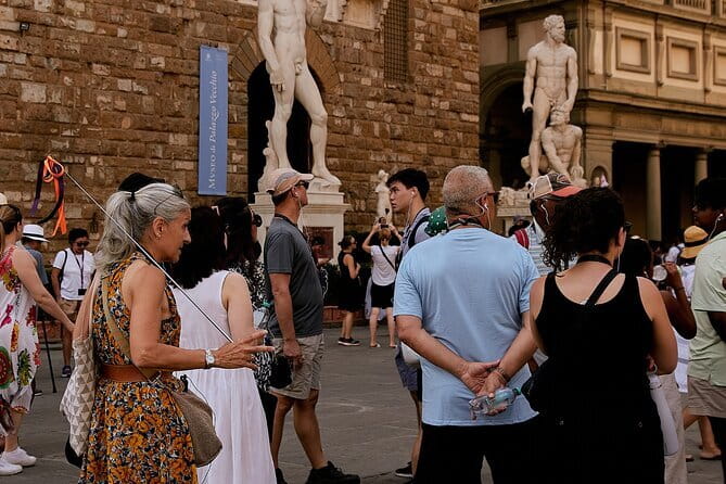 Florence: Walking Tour & Duomo Visit with Terrace & Dome Access - Medici power in Piazza della Signoria