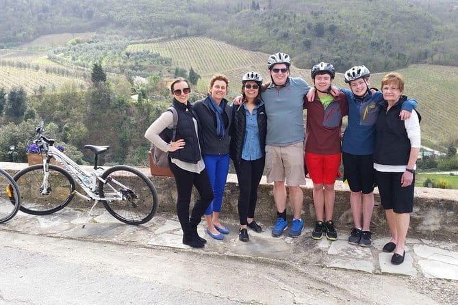 Full-Day Tuscan Countryside Bike Tour - Riding through vineyards and olive groves