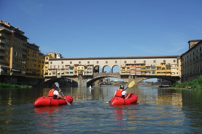 Kayaking on the Arno River in Florence under the Pontevecchio Arcade - Florence from the quiet side of the Arno