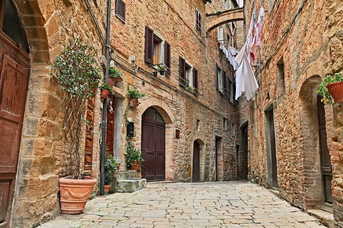 PRIVATE Full-Day Tour of San Gimignano and Volterra - Etruscan walls, Roman ruins, and medieval power